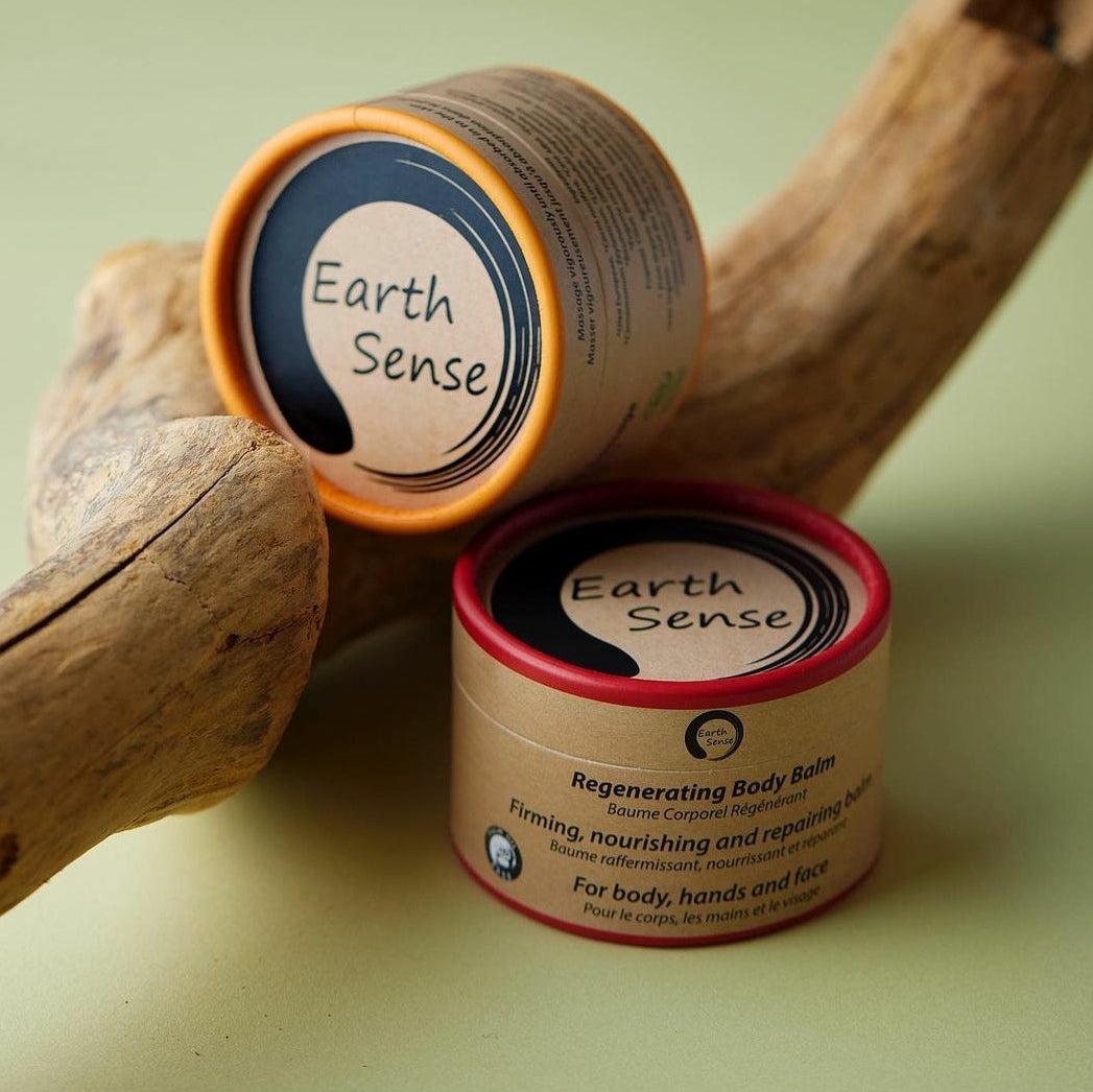 WÄRMENDER MASSAGE BALSAM | 100ml, zwei Dosen auf Holz